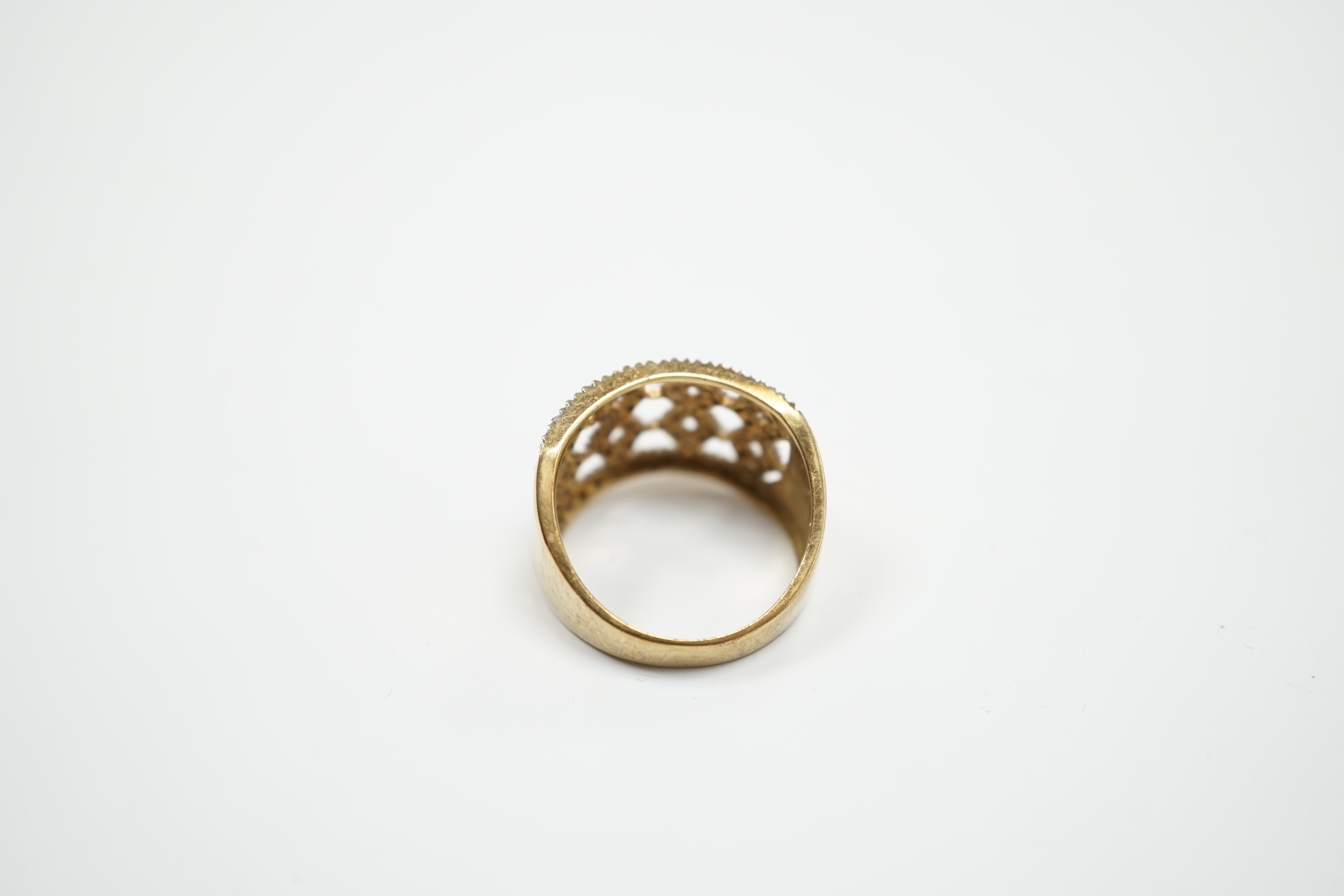 A modern 9ct gold and diamond chip cluster set dress ring, size P, gross weight 4.8 grams.
